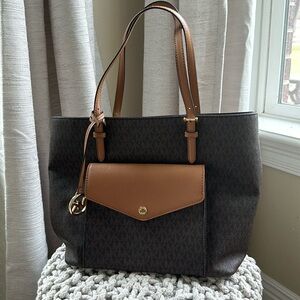 Michael Kors monogram handbag in brown and gold.